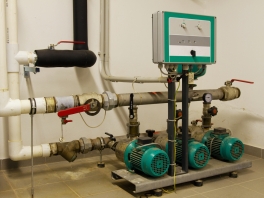 Water pipes in the boiler room and electric motors